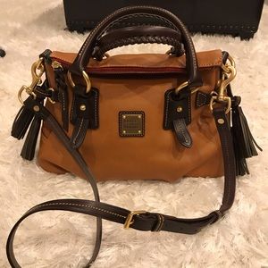 Dooney and Bourke brown satchel bag with tassels